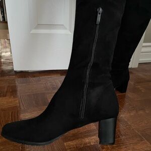 Suede boots they go over the knee.